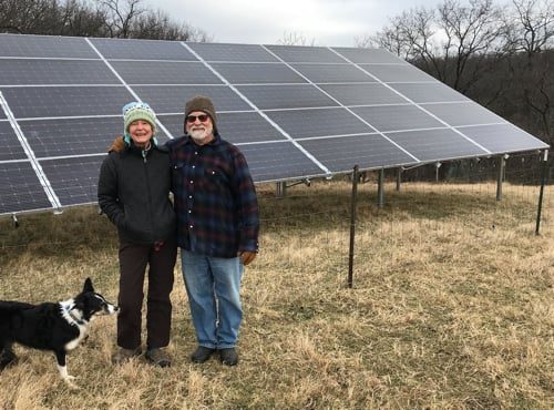 Trisha McConnell and Jim Billings with  their 11.1 kW system with 30 panels at their home. Photo: Dane County Office of Sustainability and Climate Action