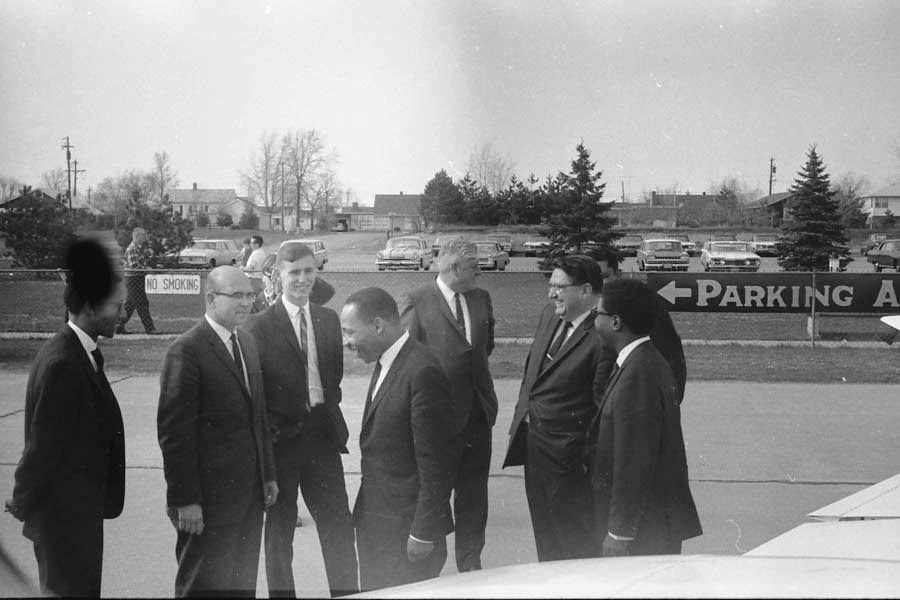 MLK arriving on tarmac at Wausau airport, 1967