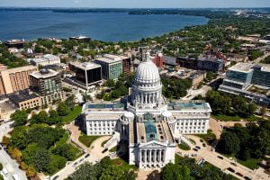 aerial view of Capitol and downtown Madison with lake in background