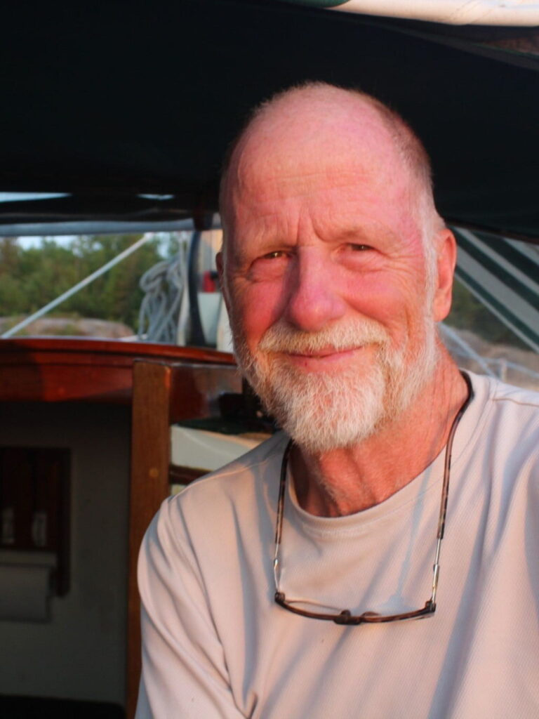 Fred Clark on a sailboat